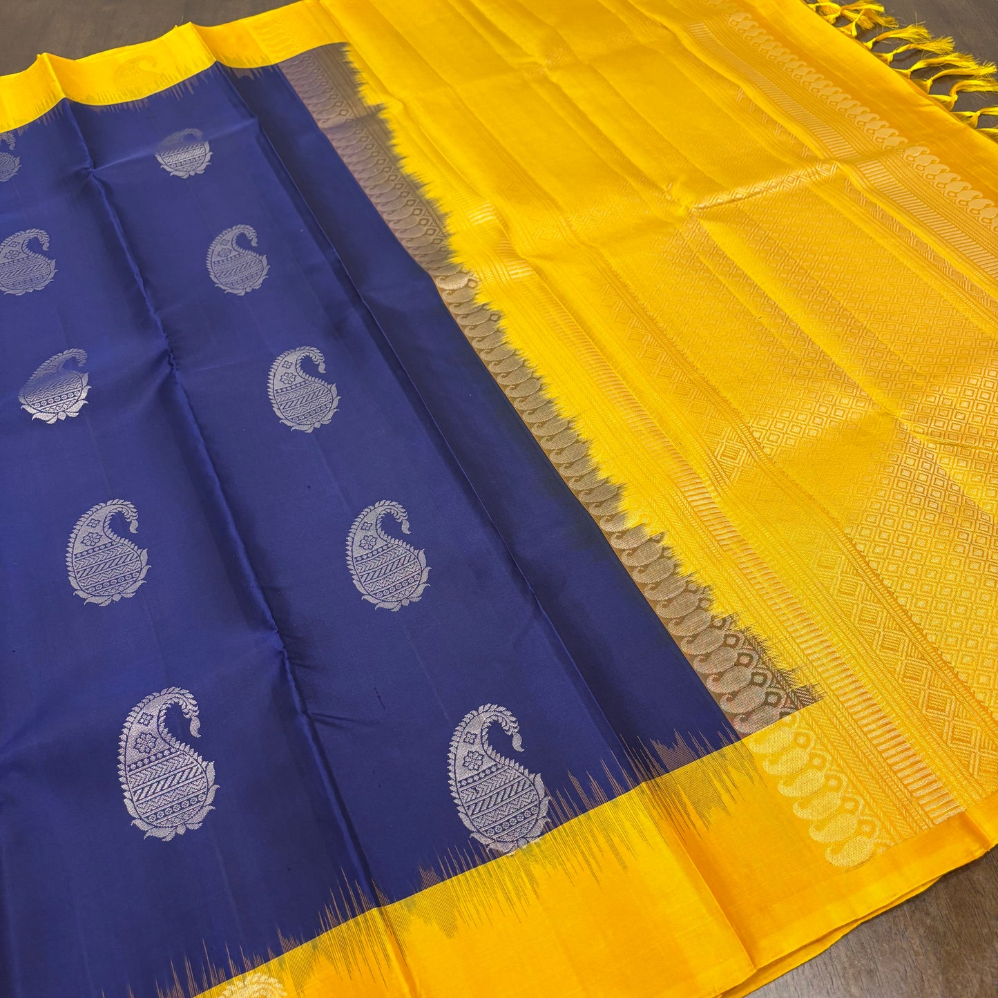 Regal Dark Blue and Yellow Kanchipuram Silk Saree with Silver Zari Work