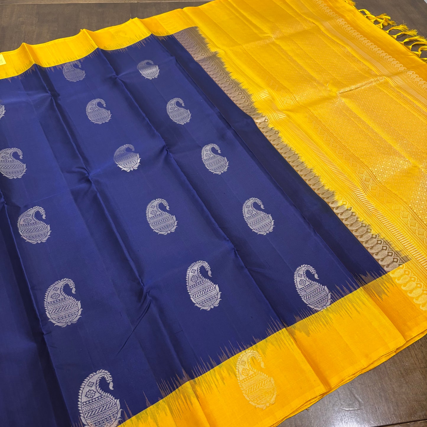 Regal Dark Blue and Yellow Kanchipuram Silk Saree with Silver Zari Work