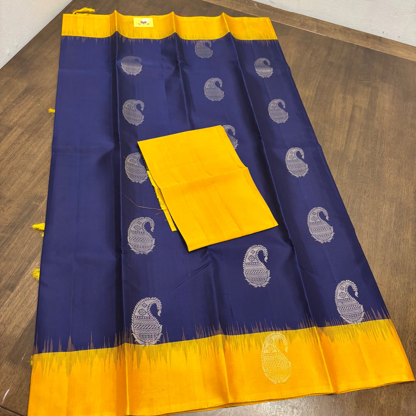 Regal Dark Blue and Yellow Kanchipuram Silk Saree with Silver Zari Work