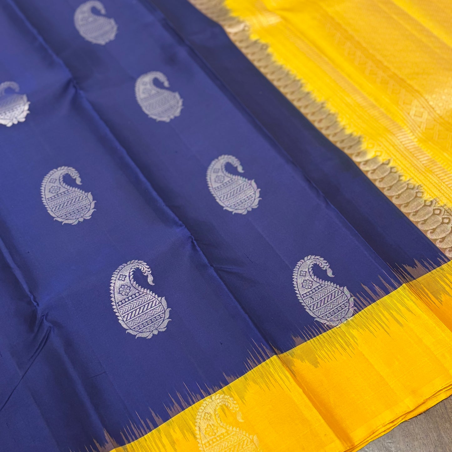 Regal Dark Blue and Yellow Kanchipuram Silk Saree with Silver Zari Work