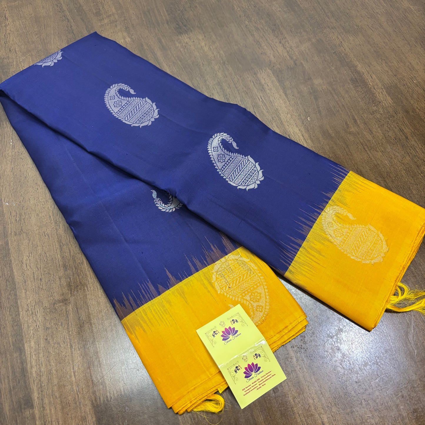 Regal Dark Blue and Yellow Kanchipuram Silk Saree with Silver Zari Work