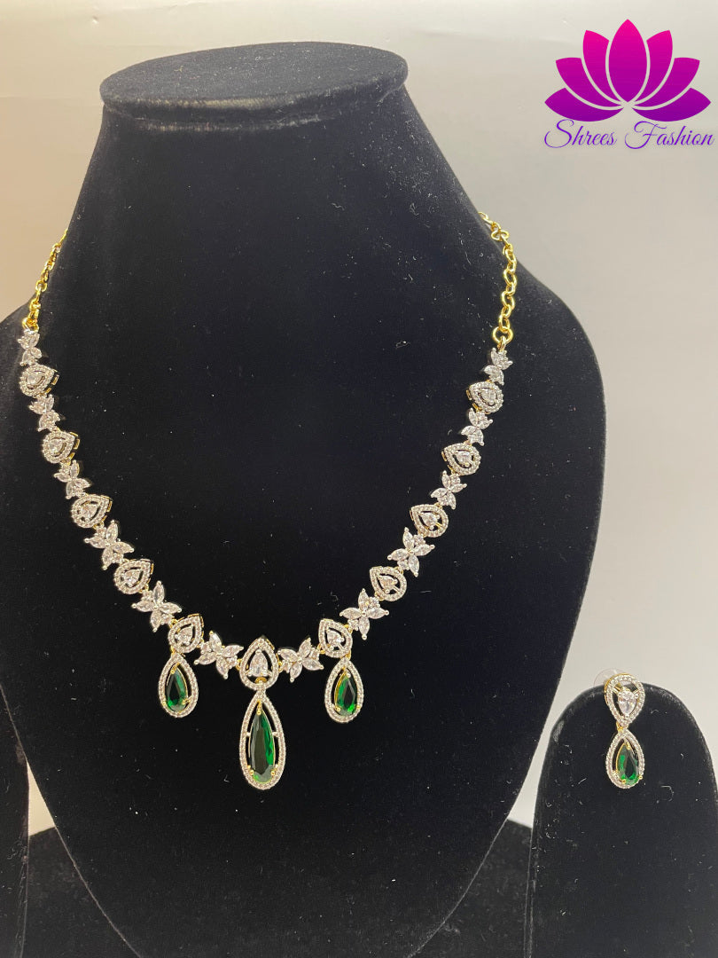 Blossom Brilliance Flower Design American Diamond Necklace with Central Green Stone Accent